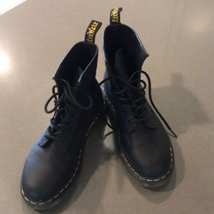 Dr. Martin’s hightop boots.